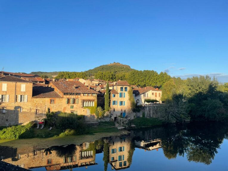 Saint Antonin Noble Val reflection in the Aveyron river